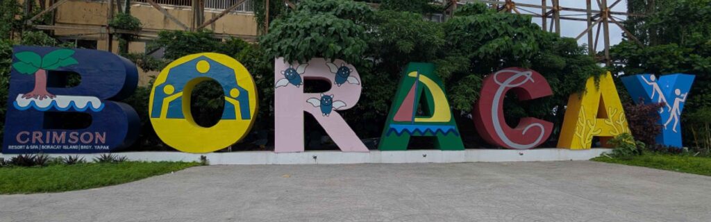 A large colorful Boracay sign with decorated letters