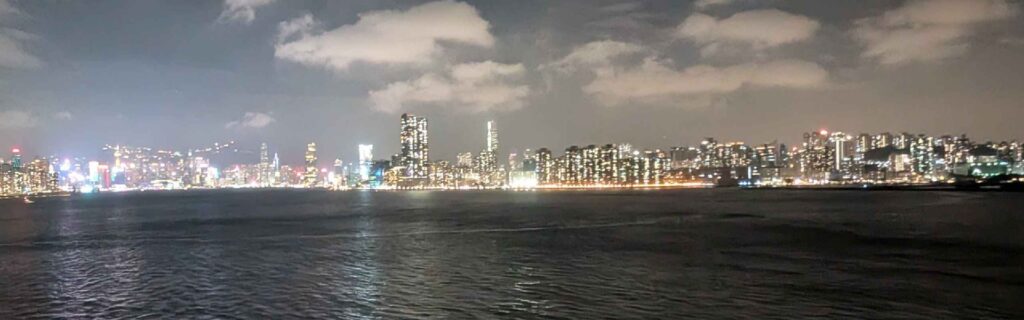 Panoramic view of Hong Kong skyline at night