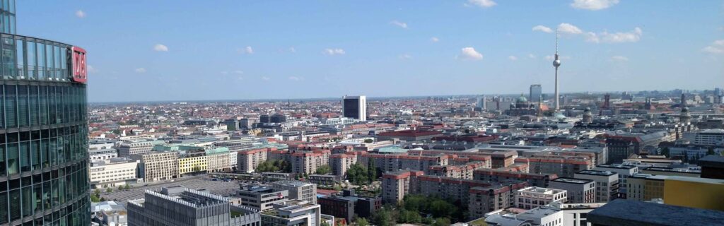 A panoramic view of Berlin city with the TV Tower on the horizon
