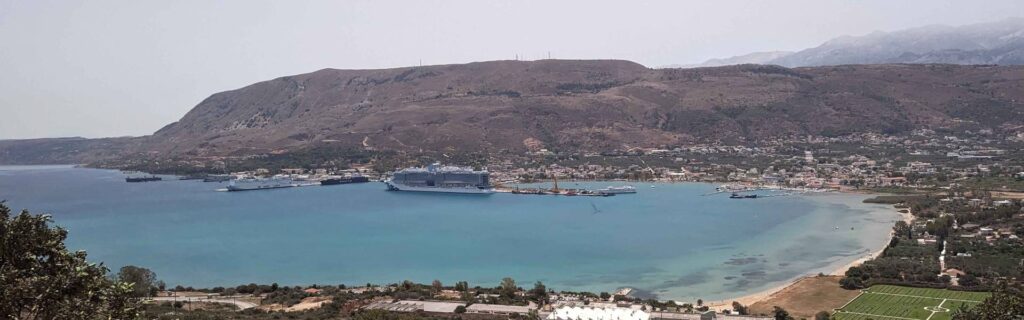 Panoramic view of Souda Bay with cruise ships docked in Crete