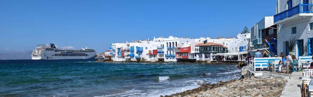 Little Venice in Mykonos with cruise ship offshore