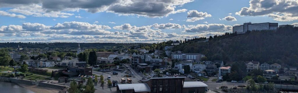 Panoramic view of Saguenay town and hillside