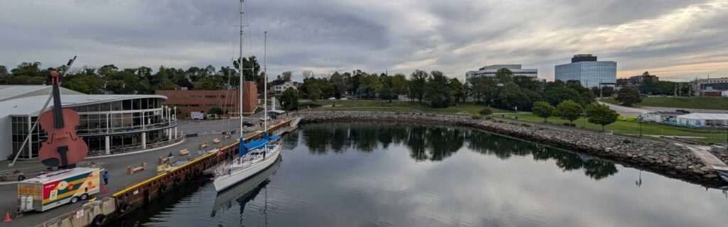 Sydney waterfront with giant violin and sailboat