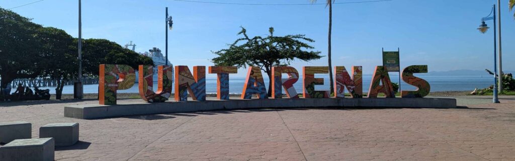 Puntarenas beachfront sign with ocean view