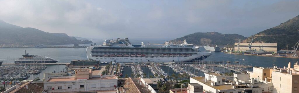 Panoramic harbor view of Cartagena Spain with cruise ships marina and surrounding hills
