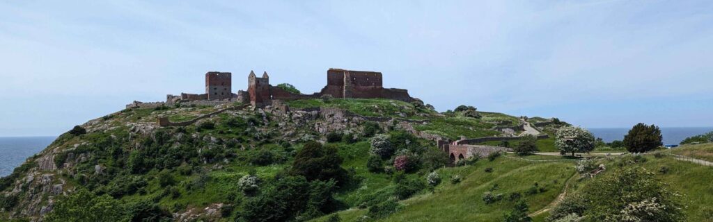 Panoramic view of Hammershus Castle Ruins above the Baltic coastline on Bornholm.